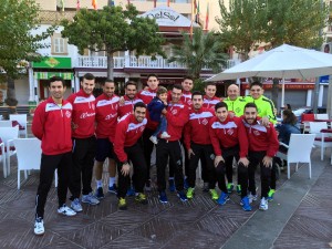 El Palma Futsal, antes de la carrera, con el pequeño Izan Pérez