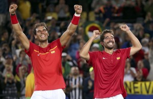 2016 Rio Olympics - Tennis - Final - Men's Doubles Gold Medal Match - Olympic Tennis Centre - Rio de Janeiro, Brazil - 12/08/2016. Rafael Nadal (ESP) of Spain and Marc Lopez (ESP) of Spain celebrate after winning their match against Florin Mergea (ROU) of Romania and Horia Tecau (ROU) of Romania. REUTERS/Kevin Lamarque FOR EDITORIAL USE ONLY. NOT FOR SALE FOR MARKETING OR ADVERTISING CAMPAIGNS.