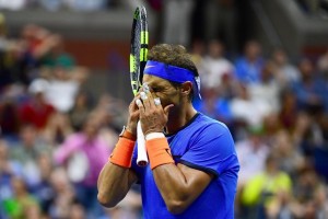 NEW YORK, NY - SEPTEMBER 04: Rafael Nadal of Spain reacts against Lucas Pouille of France during his fourth round Men's Singles match on Day Seven of the 2016 US Open at the USTA Billie Jean King National Tennis Center on September 4, 2016 in the Flushing neighborhood of the Queens borough of New York City. Alex Goodlett/Getty Images/AFP == FOR NEWSPAPERS, INTERNET, TELCOS & TELEVISION USE ONLY ==