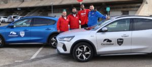 Laron Smith y Osvaldas Matulionis junto a responsables de Comrpar Coche en Baleares